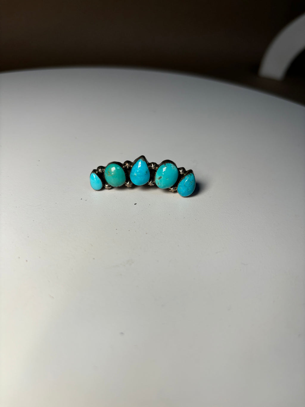 Native turquoise ear climber by Gregg Yazzie