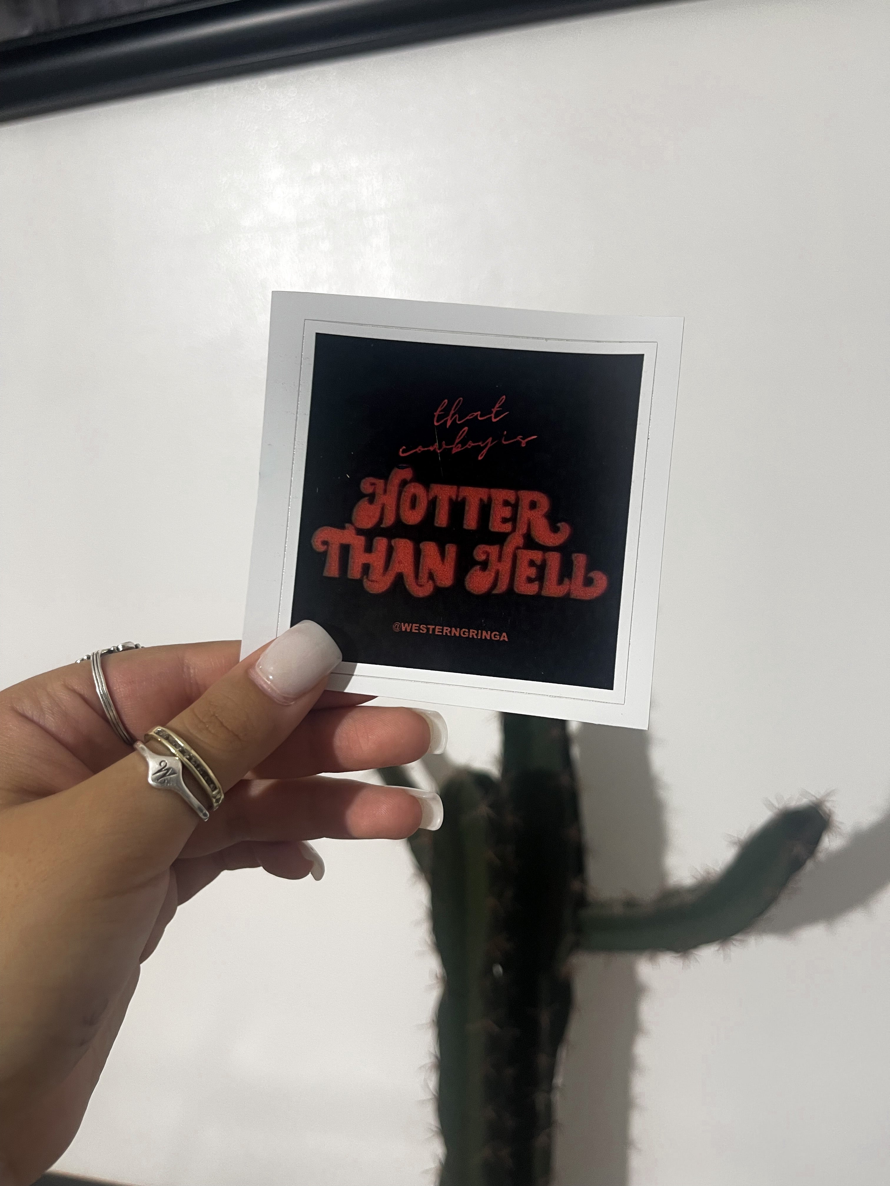 that cowboy is hotter than hell sticker
